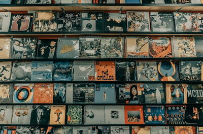 Vinyl albums on a shelf in a record store